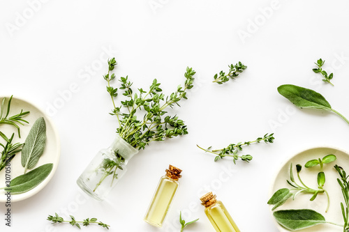 Bilde på lerret Medicine made from wildflowers and herbs with essential oils on white background