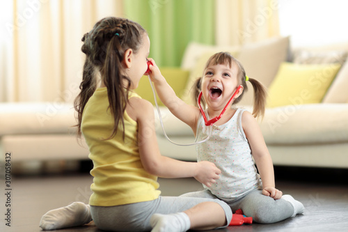 Two kids girls have fun pla...