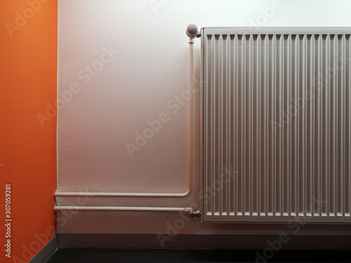 Wallpaper Mural Convection radiator, or radiant space heater with steel body and rotary control regulator for energy saving. Home and office engineering equipment of central heating system. Torontodigital.ca