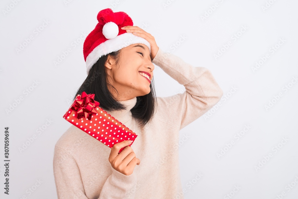 Young chinese cleaner woman wearing gloves holding mop over isolated white background stressed with hand on head, shocked with shame and surprise face, angry and frustrated. Fear and upset for mistake Young chinese cleaner woman wearing gloves holding mop over isolated white background stressed with hand on head, shocked with shame and surprise face, angry and frustrated. Fear and upset for mistake