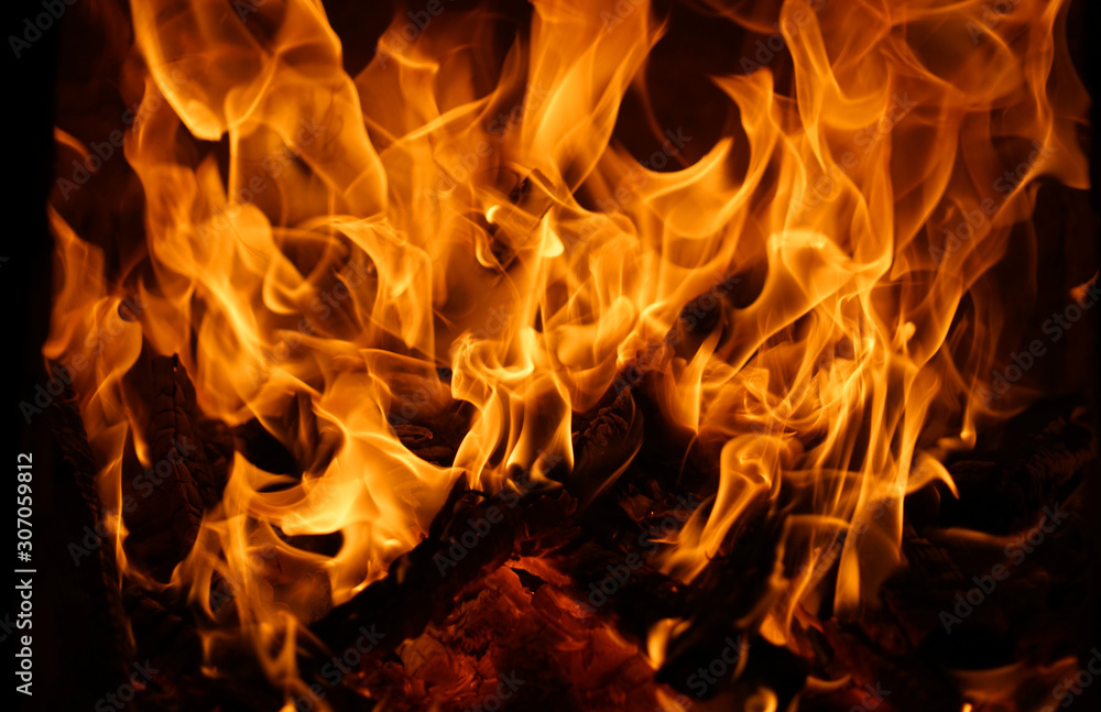 burning fire flame on the black background burning fire flame on the black background