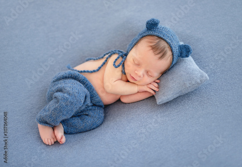 Charming newborn in cute hat