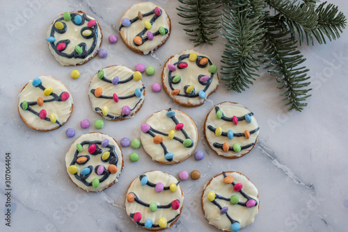 Traditional home made Christmas Lights Cookies on a festive christmas background