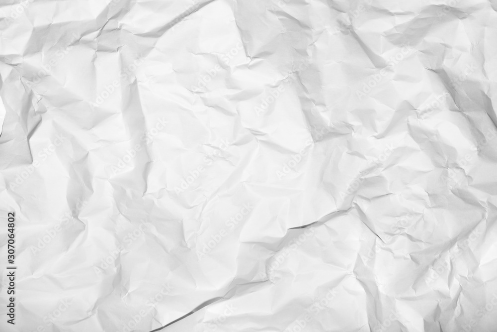 Obraz premium White crumpled paper texture background. 