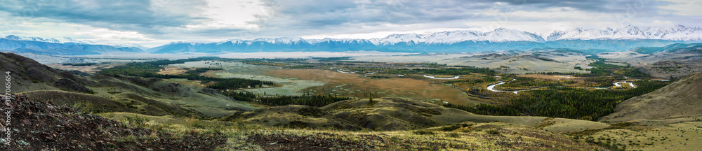 Dawn panorama of the Chuya river valley with a view of the North Chuysky ridge. Mountain Altai, Russia Dawn panorama of the Chuya river valley with a view of the North Chuysky ridge. Mountain Altai, Russia