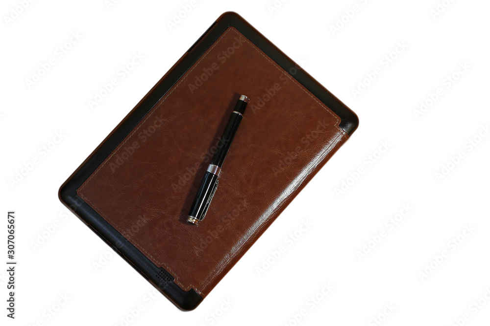 E-BOOK WITH PEN ON WHITE BACKGROUND E-BOOK WITH PEN ON WHITE BACKGROUND