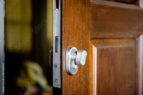 Door lock attached to the wooden door