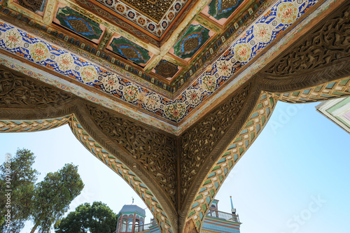 The ceiling in the form of a dome in a traditional ancient Asian mosaic. The details of the architecture of medieval Central Asia