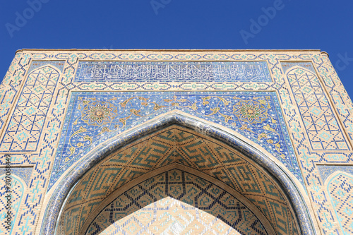 The arch and gates of the ancient Asian traditional ornament. The details of the architecture of medieval Central Asia