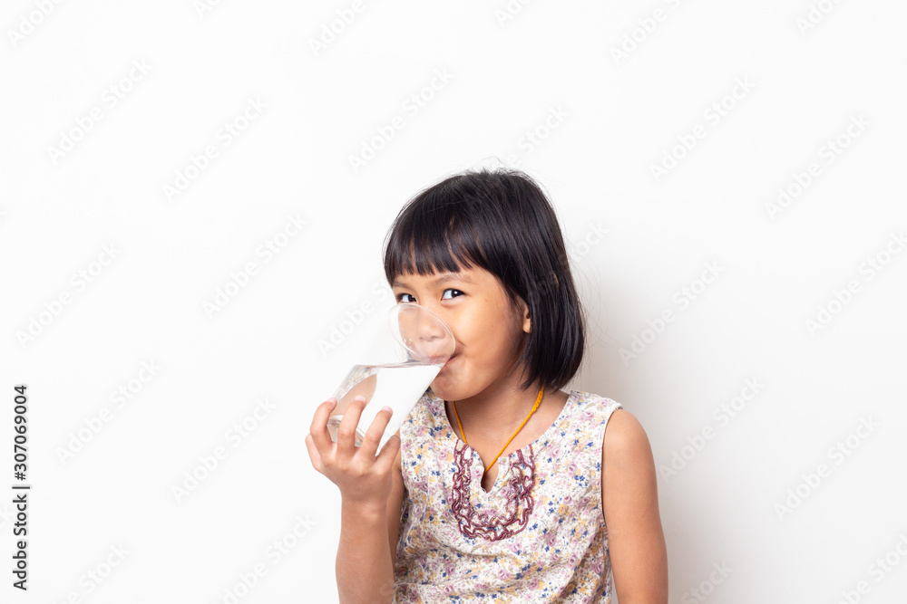 Portrait of asian little girl drinking water on White Blackground Portrait of asian little girl drinking water on White Blackground
