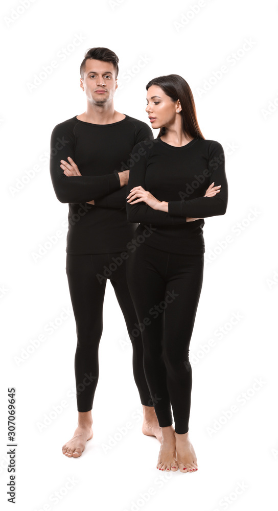 Couple wearing thermal underwear isolated on white Couple wearing thermal underwear isolated on white