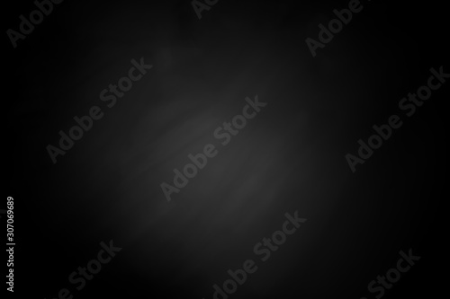 Abstract image photo of old wall texture in black and white tone with dark border shadow vignette.