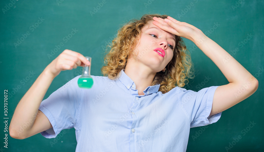 Disgusting experiment. Student practicing on hateful lesson. College student performing chemical reaction. Chemical liquid smelling really bad. High school classes. Girl student dislike chemistry Disgusting experiment. Student practicing on hateful lesson. College student performing chemical reaction. Chemical liquid smelling really bad. High school classes. Girl student dislike chemistry