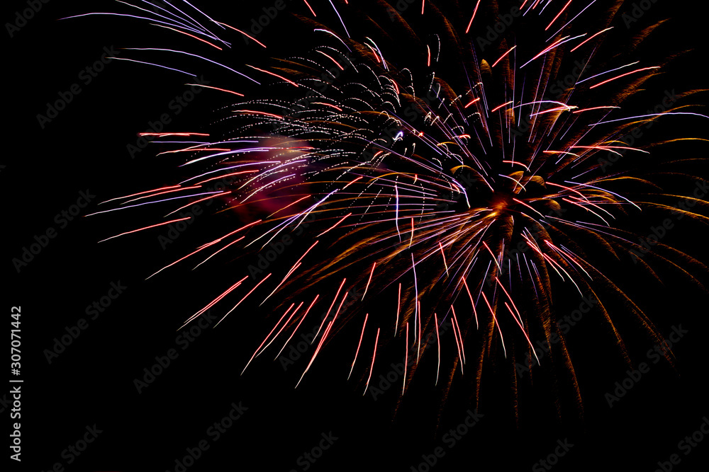 Fireworks isolated on black or dark background at night time. Fireworks isolated on black or dark background at night time.