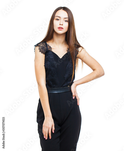 Beautiful brunette woman in black dress