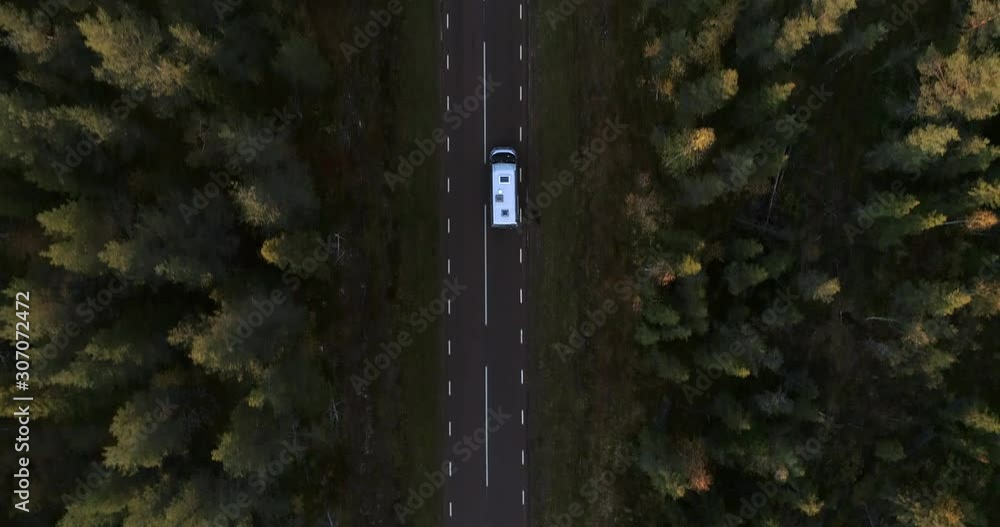 Camper van on a forest road, aerial, top down, drone shot, above a rv ...