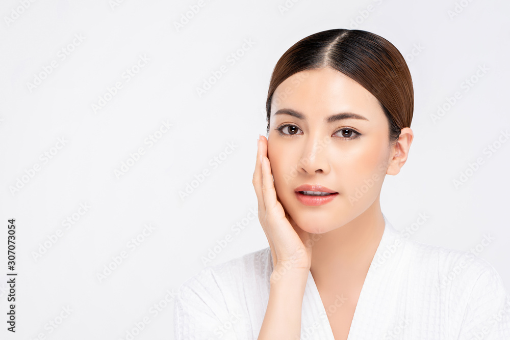 Youthful bright skin pretty Asian woman with hand touching face Youthful bright skin pretty Asian woman with hand touching face