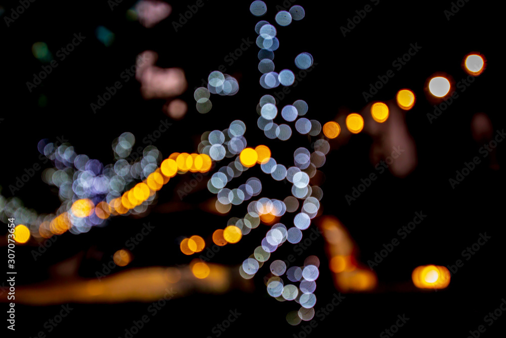 Beautiful bokeh from light on the tree at garden park and car. Beautiful bokeh from light on the tree at garden park and car.