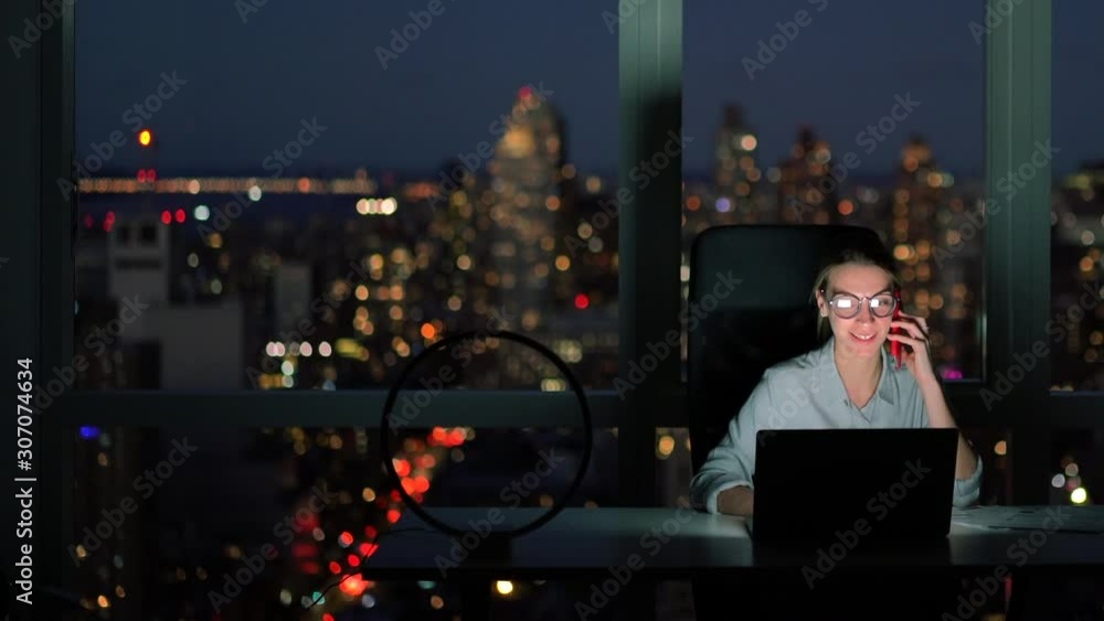 Attractive female in formal wear making mobile conversation during digital marketing on laptop website, workaholic woman making exchange operations via netbook application Attractive female in formal wear making mobile conversation during digital marketing on laptop website, workaholic woman making exchange operations via netbook application
