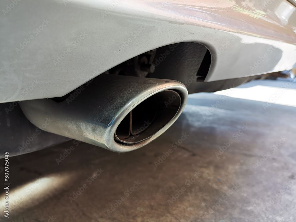 Close up of a car exhaust pipe.