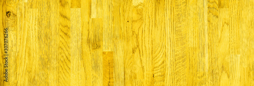 Yellow - wooden textured background. 
