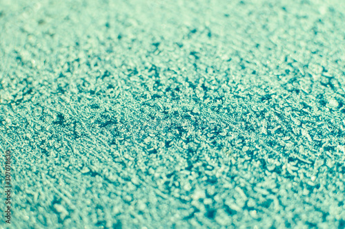 Green snowy surface.