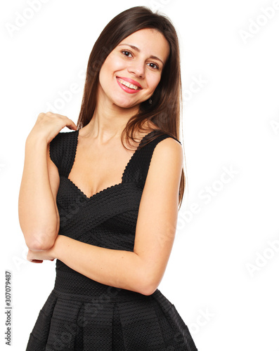 Beautiful brunette woman in black dress © Andrey_Arkusha