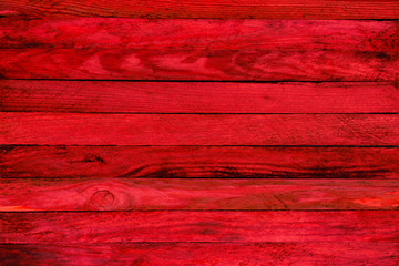 Red wood texture. Background old red panels. 