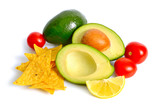 Avocado with tomatoes and lemon. Ingredients for Guacamole. Isolated