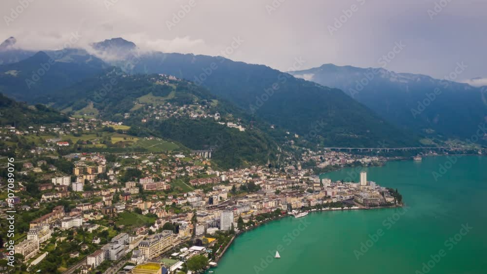 flight over montreux city lake bay sunny day storm sky aerial panorama 4k timelapse switzerland flight over montreux city lake bay sunny day storm sky aerial panorama 4k timelapse switzerland