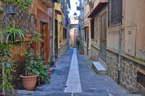 A small street among the old houses of Sessa Aurunca  a medieval village in the province of Caserta