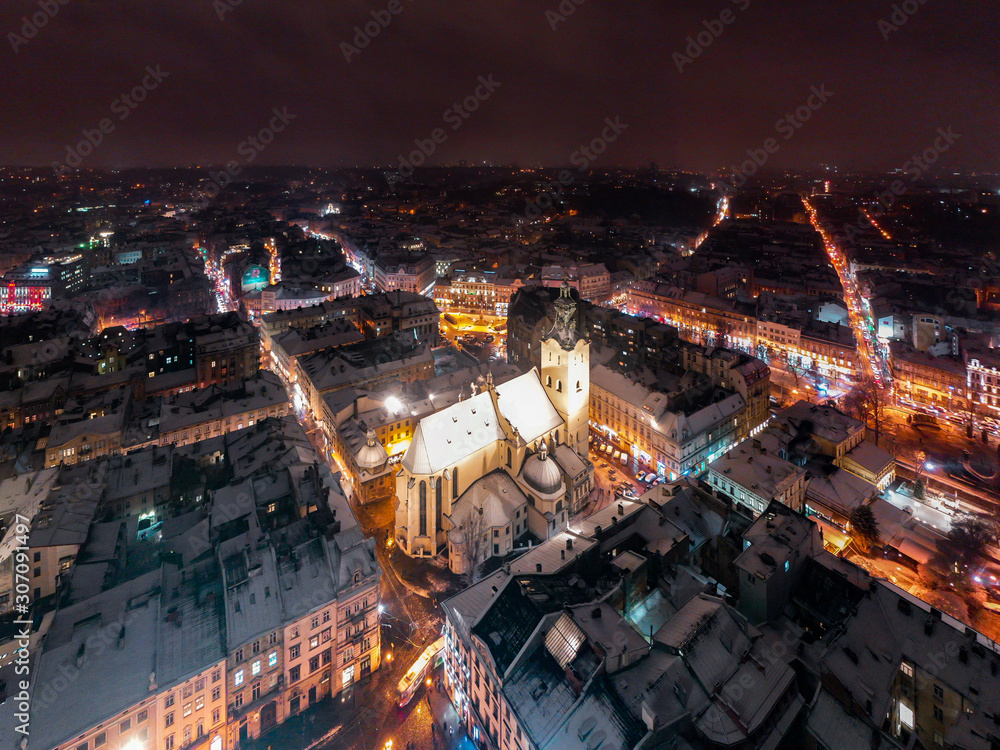 Fototapeta premium Aerial view on Latin cathedral in winter Lviv from drone
