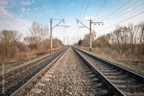 Train rails in country landscape