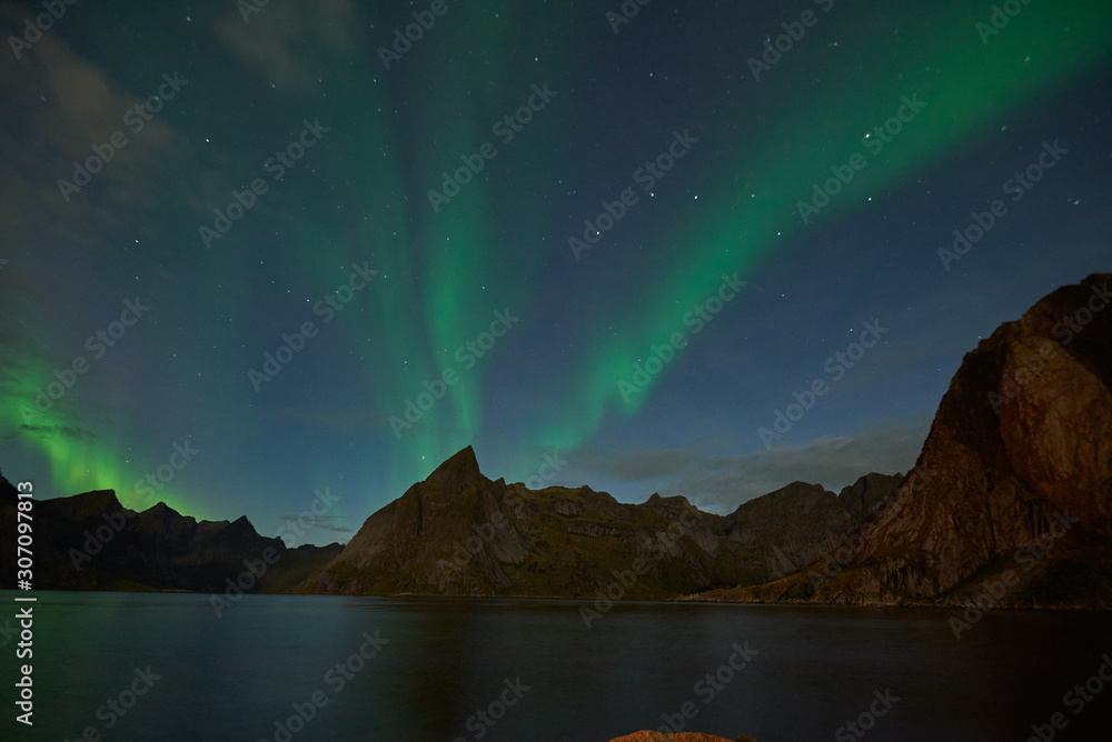Aurora borealis in Reine, Lofoten Islands, night landscape