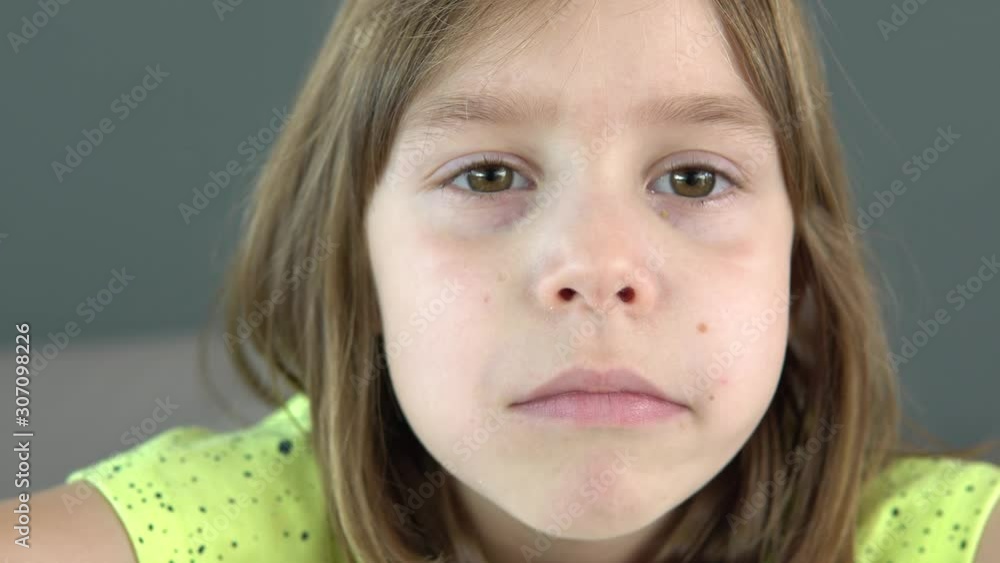 A small child, a girl of European or American appearance, close-up shot. A model eats breakfast at a food court or restaurant. A girl with blond hair 5-6 years old. A small child, a girl of European or American appearance, close-up shot. A model eats breakfast at a food court or restaurant. A girl with blond hair 5-6 years old.