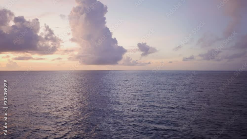 Timelapse of a sunrise at the ocean filmed on a moving ship. Timelapse of a sunrise at the ocean filmed on a moving ship.