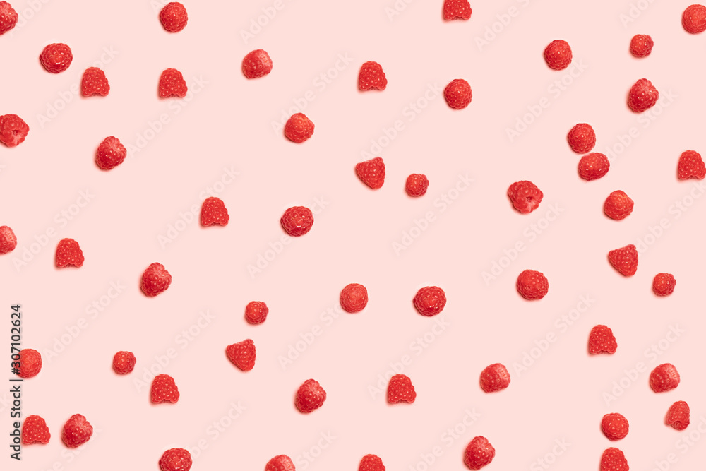 Healthy Food and Nutrition. Juicy ripe red raspberry berries pattern on a pink background. Healthy Food and Nutrition. Juicy ripe red raspberry berries pattern on a pink background.
