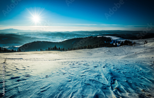 Top view of a spacious snow-covered ski slope