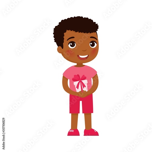 Little boy holding festive gift box flat vector illustration. Dark skin kid with Valentines Day, Birthday present. Smiling kid character with surprise. February 14 holiday isolated design element photo