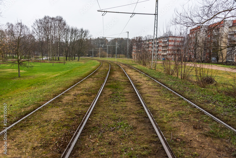 Electric Train Tracks in a City in Latvia Electric Train Tracks in a City in Latvia
