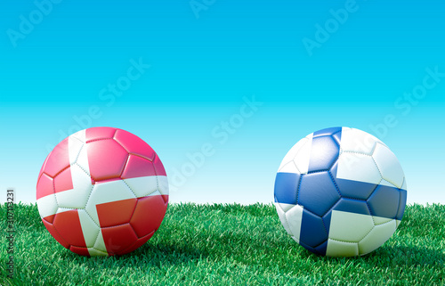 Two soccer balls in flags colors on green grass. Denmark and Finland. 3d image