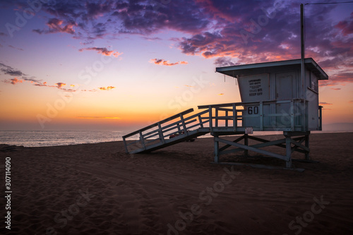 Lifeguard Tower on the Beach at Sunset © Patrick