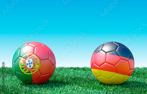 Two soccer balls in flags colors on green grass. Portugal and Germany. 3d image