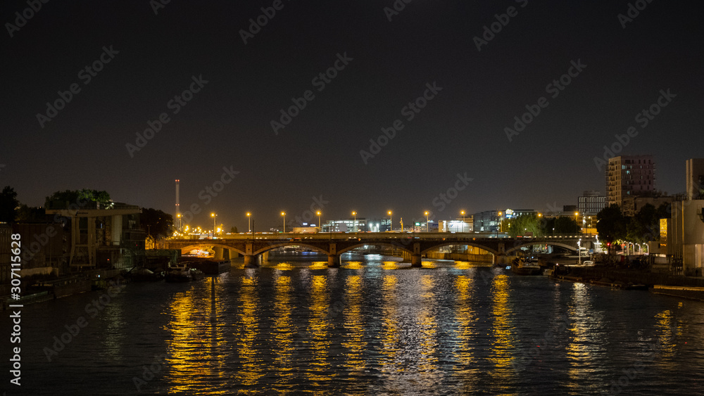 Bridge over a river at night, Seine, Paris