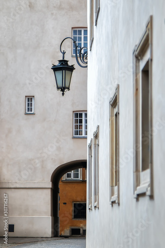 One of the narrow picturesque streets in Warsaw  Poland  old town  in spring  at noon