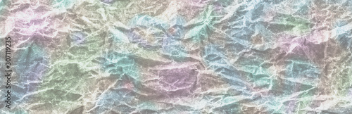 Background color crumpled paper panorama. View from above.