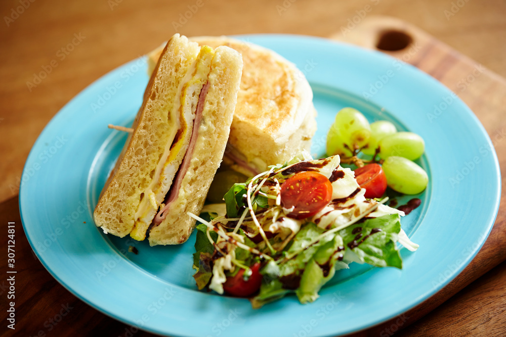 English muffin sandwich with salad 