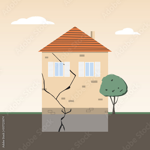 House Wall with Crack in Foundation