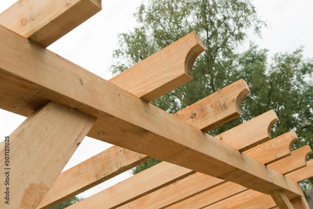 Carpenter. Construction site.Wooden construction. Frame.. Building a barn