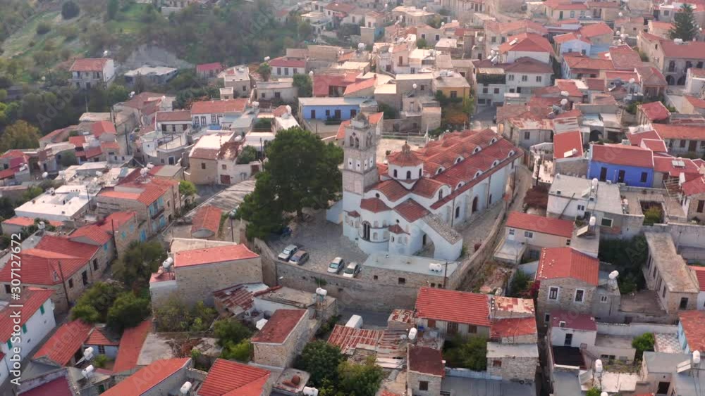 Aerial view of Pano Lefkara village in Larnaca district, Cyprus. Famous old village in mountains with orange roofs Aerial view of Pano Lefkara village in Larnaca district, Cyprus. Famous old village in mountains with orange roofs
